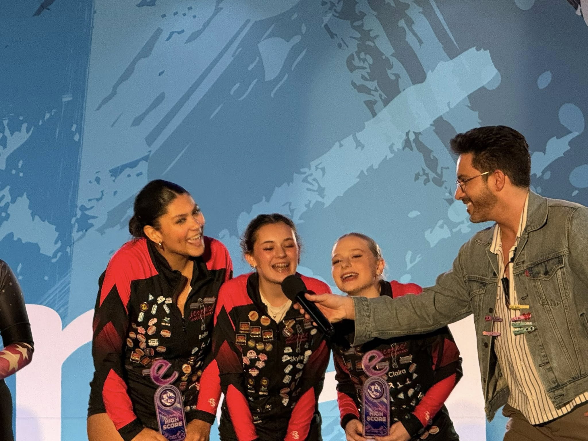 Dancers being interviewed on stage